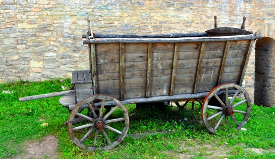 old wooden cart soyaschaya near the wall