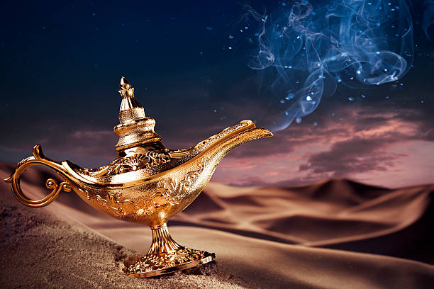 Magic Aladdin's Genie lamp on a desert Aladdin magic lamp on a desert with smoke magic lamp photos stock pictures, royalty-free photos & images
