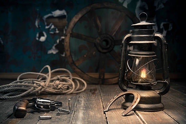 istock Old western background with the dramatic light of a lantern 462463057