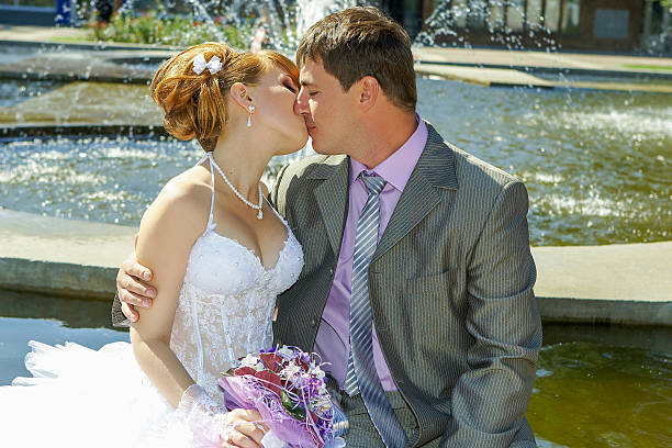 istock bride and groom gentle kiss 462465351