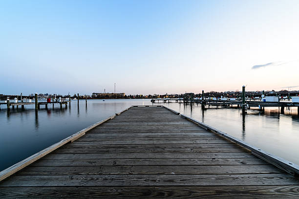 istock Sea pier at sun set 462465487