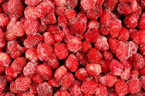 Photo of many frozen strawberry