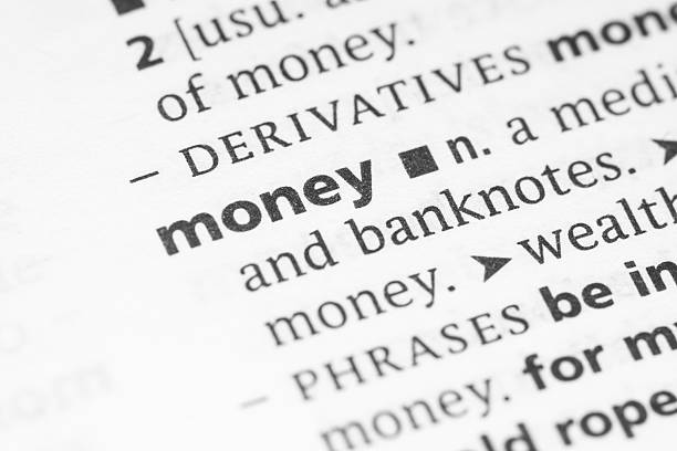 Word money found in dictionary stock photo