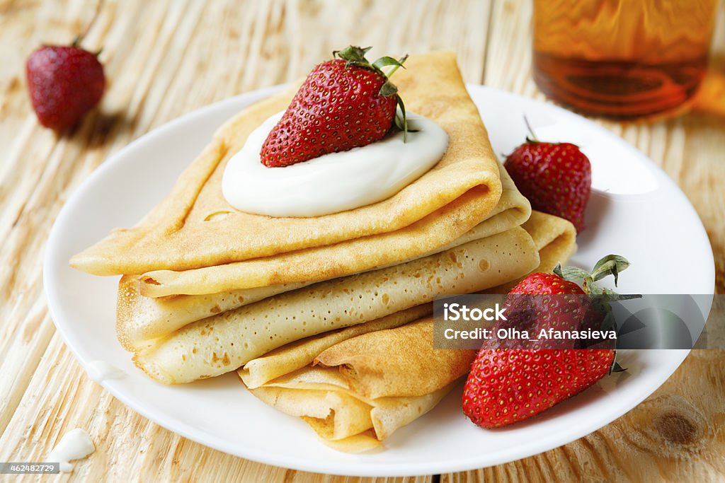 pancakes with fresh strawberries pancakes with fresh strawberries, food close up Beige Stock Photo