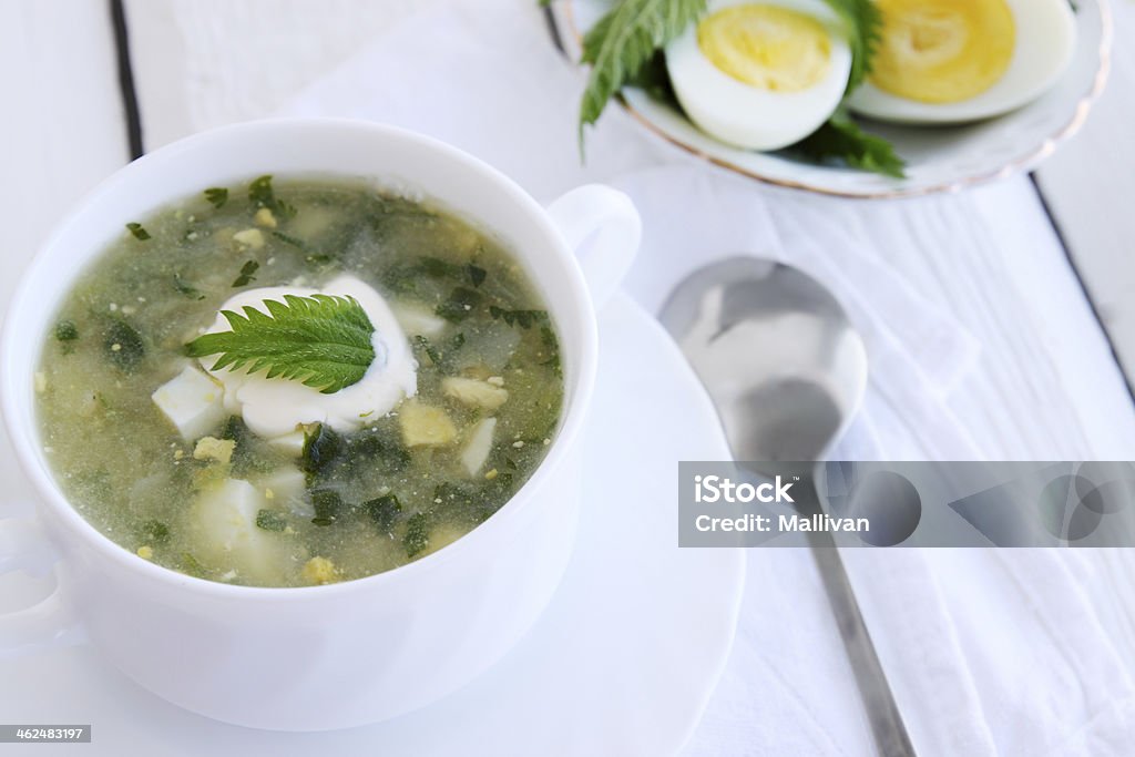 Soup with sorrel and nettles Green borsch with nettles, sorrel and boiled eggs Bowl Stock Photo