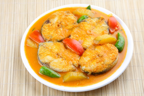 Asian style Fish curry with tomato and coconut milk mango