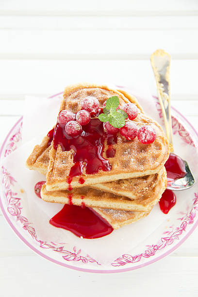 istock Homemade waffles with jam and currants. 462494375