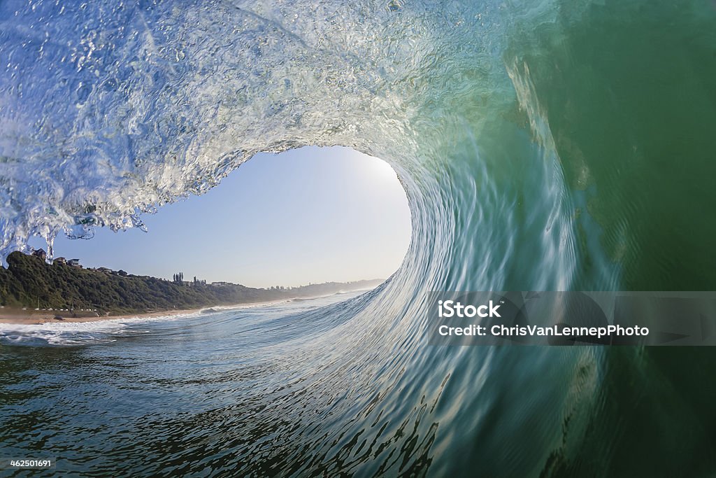 Wave Hollow Inside Out Swimming surfing view of hollow crashing ocean wave inside vortex looking out . Wave - Water Stock Photo