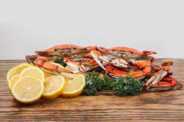 istock Steamed Blue Crabs on a wooden table 462502783