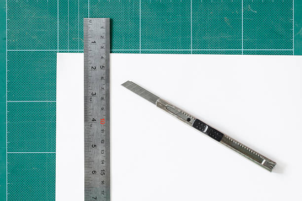 istock Green cutting mats with iron ruler and cuter 462511169
