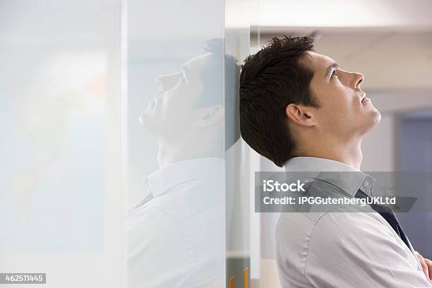 Side View Of Unhappy Businessman Stock Photo - Download Image Now - Adult, Bad News, Boredom