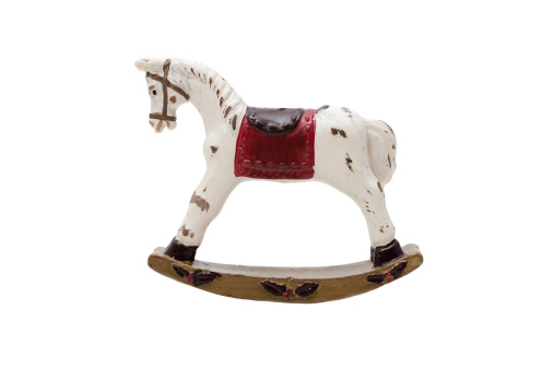 An antique toy rocking horse, isolated on white. Side view of the old object. (XXXLarge)