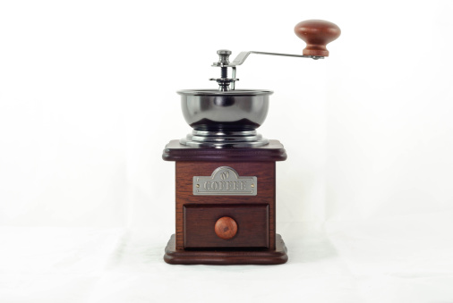 Coffee grinder on white background