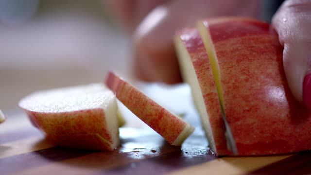 Slicing Apples on a cutting board