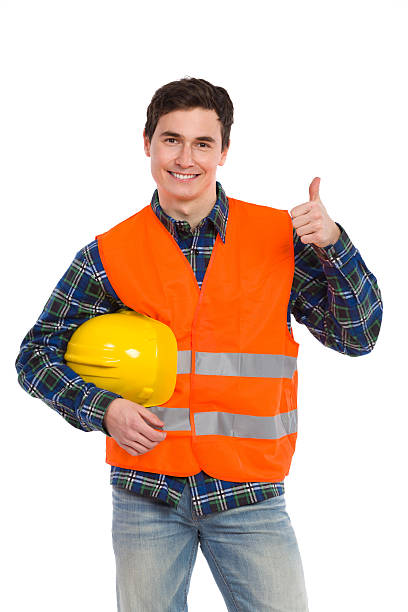 istock Engineer wearing reflective clothing and showing thumb up. 462538413