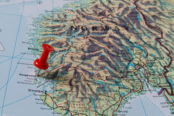 Haugesund Marked with Red Pushpin on Norway Map Haugesund marked with red pushpin on map. Selected focus on Haugesund and bright red puspin. Pushpin is in an angle. Some parts of Norway can be seen on map. green map of norway stock pictures, royalty-free photos & images