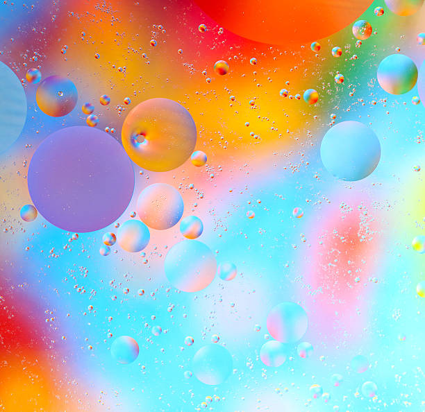 istock Colorful drops of oil on water 462542721
