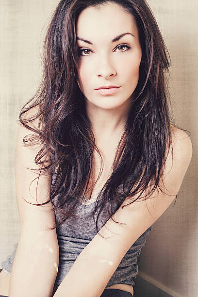 istock Beautiful Woman, Serious Expression, textured 462549283