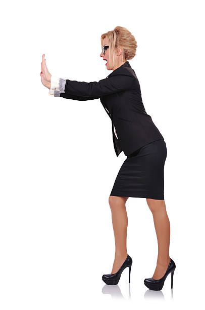 istock businesswoman pushing 462550011