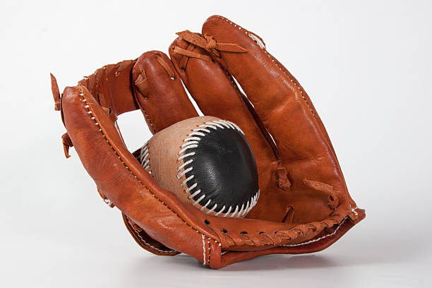 istock Baseball Glove with ball 462550797