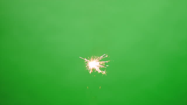 Floating burning sparkler on green screen HD