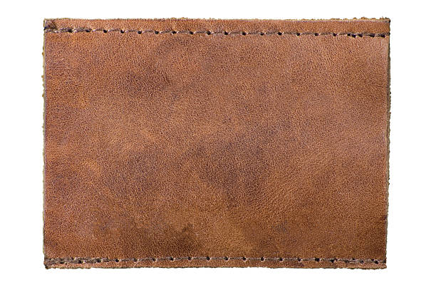 istock Jeans Tag Grunge Blank Natural Leather Label, Isolated Macro Background 462555475
