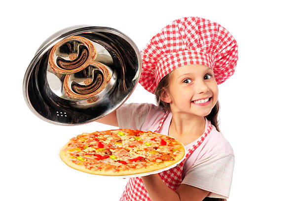 Little girl preparing pizza