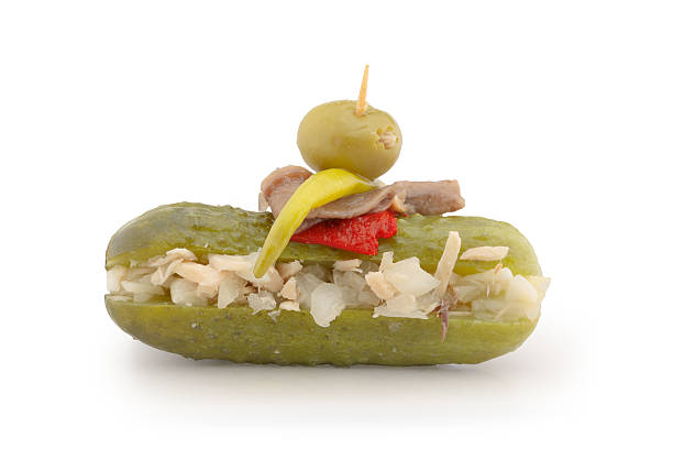 skewern with olive, cucumbers, onion, pepper, tuna and chili Typical spanish pincho. Skewer with olive, cucumbers, onion, pepper, tuna and chili banderilla stock pictures, royalty-free photos & images
