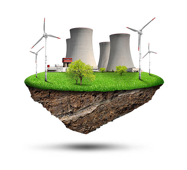 istock Little island with nuclear power plant and wind turbines 462571371