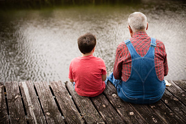 istock Fishing With Grandpa, Rear View 462575495