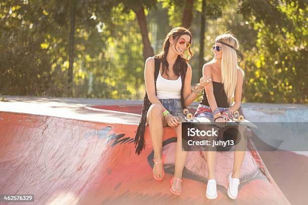 Two Young Woman At Skatepark Stock Photo - Download Image Now - Adult, Autumn, Cheerful