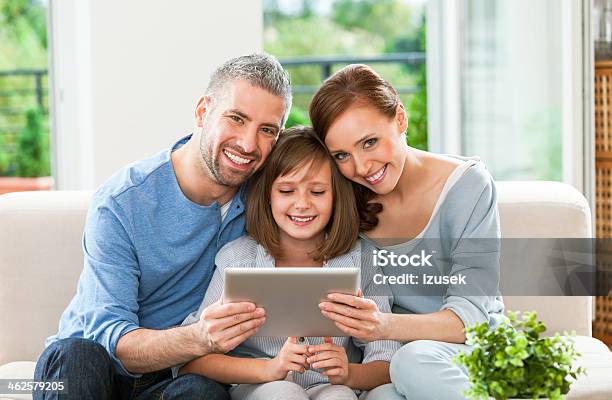 Happy Family With Digital Tablet Stock Photo - Download Image Now - Digital Tablet, Family, Home Interior