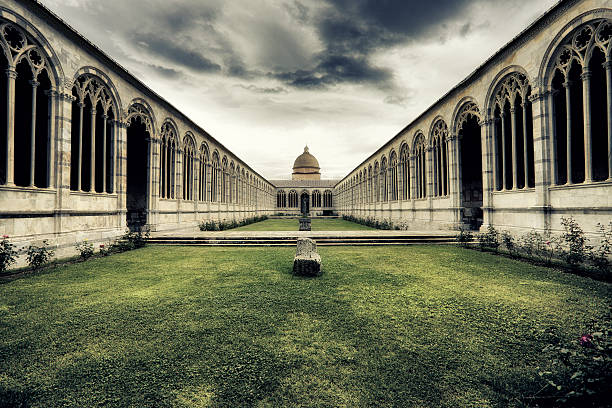 Courtyard behind monumental cemetery (Camposanto) of Pisa.Tuscany, Italy.\u2028http://www.massimomerlini.it/is/pisa.jpg\u2028http://www.massimomerlini.it/is/florence.jpg\u2028http://www.massimomerlini.it/is/tuscany.jpg