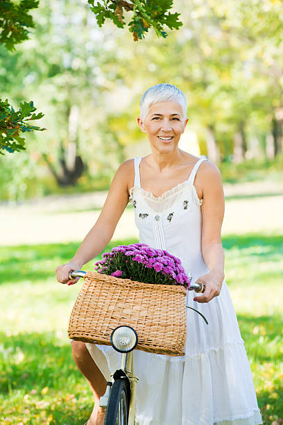 540+ One Mature Woman Cycle Spring Stock Photos, Pictures & Royalty ...