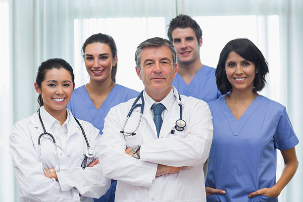 istock Doctors and nurse posing together 462580557
