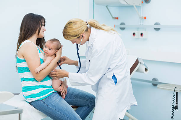 istock Mother holding a newborn in her arms 462582621