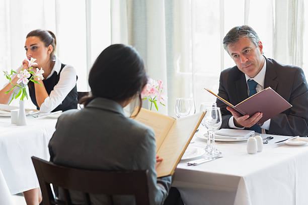 istock Businesspeople choosing their food in restaurant 462583323