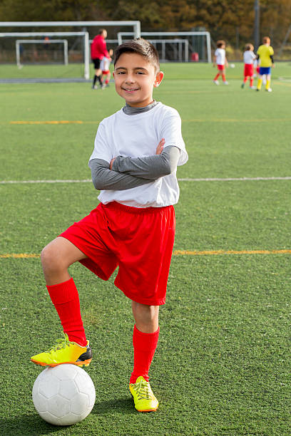 istock Young Boy With Soccer Ball 462583697