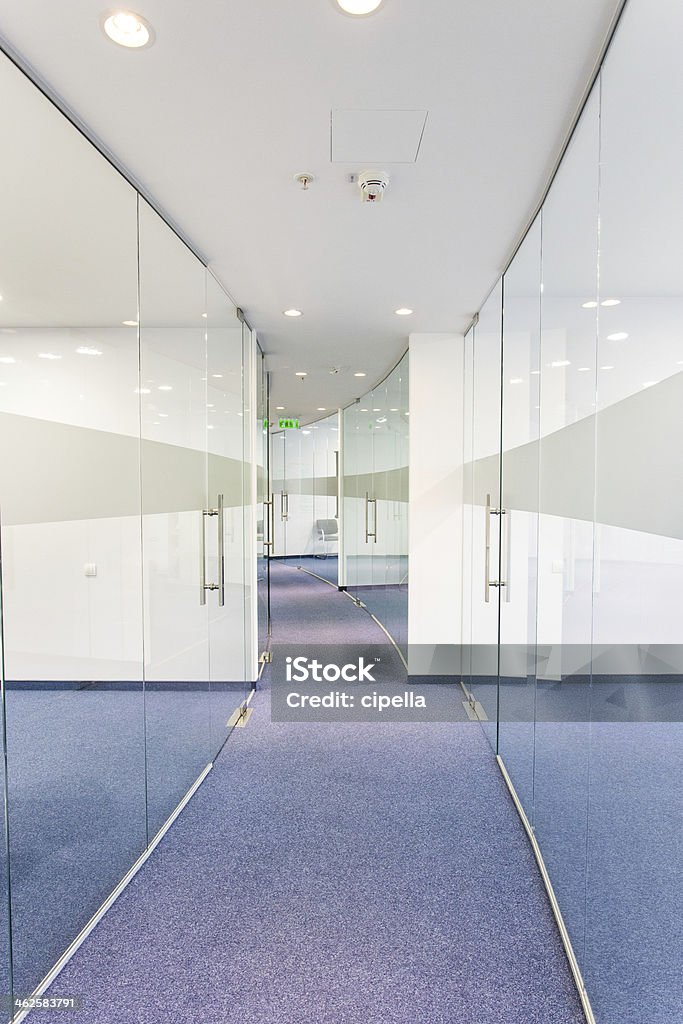 Office building interior Glass office partition walls. Desk Stock Photo