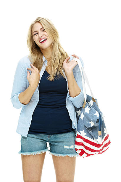 istock Happy young woman standing 462586555