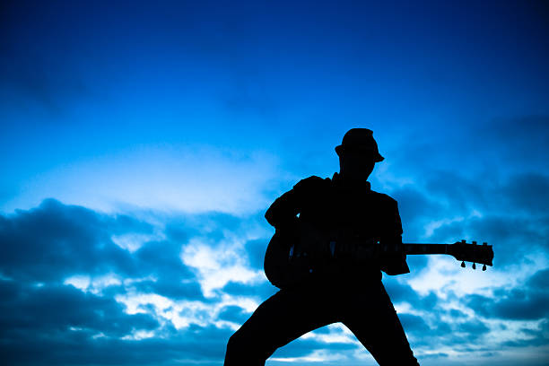 istock Silhouette of a Musician 462587373
