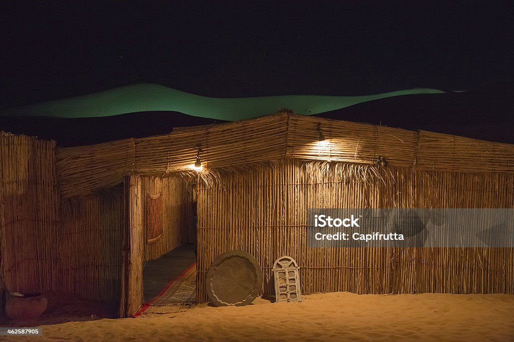 Bedouin straw hut Bedouin village in Dubai Desert at night Arabia Stock Photo