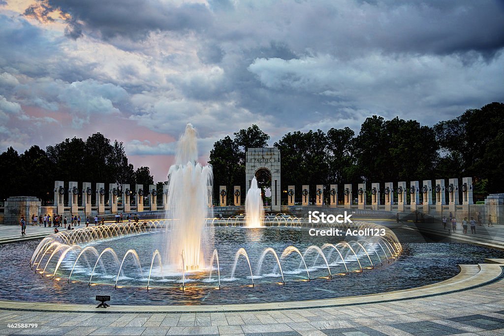 World War II Memorial in Washington, DC at Sunset A photograph of the World War II Memorial at sunset. The Memorial is located on the National Mall in Washington, DC and is the first national memorial dedicated to all who served during World War II. It is located on 17th Street, between Constitution and Independence Avenues, and is flanked by the Washington Monument to the east and the Lincoln Memorial to the west. This photo was taken at sunset. National World War II Memorial Stock Photo