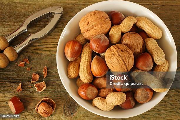Nuts With Nutcracker Stock Photo - Download Image Now - Bowl, Brown, Circle