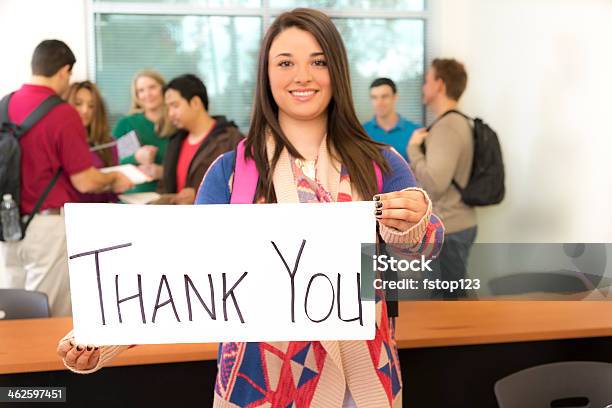 Education Latin College Student Holds Thank You Sign Stock Photo - Download Image Now