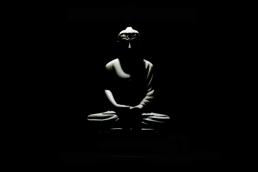 Buddha statue in the dark