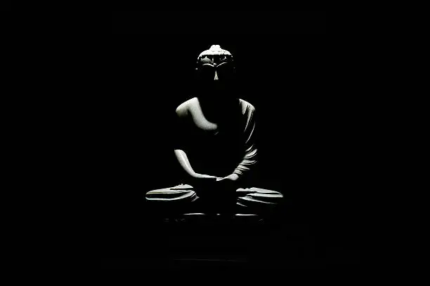 Buddha statue in the dark