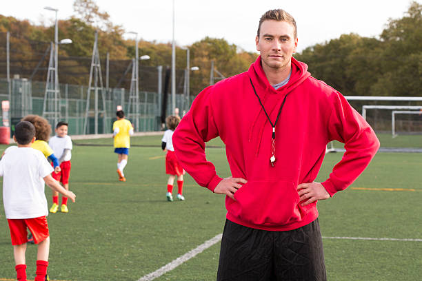 Soccer Coach On The Pitch