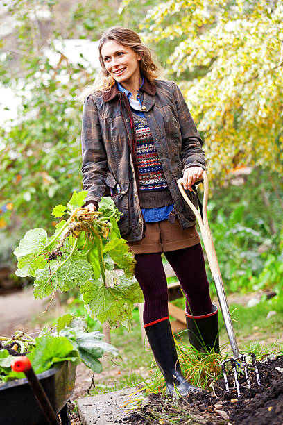 istock Young woman in the garden 462603107