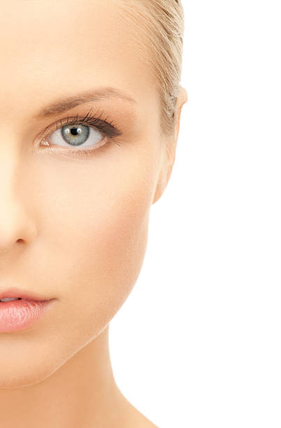 istock half face of beautiful woman 462607479